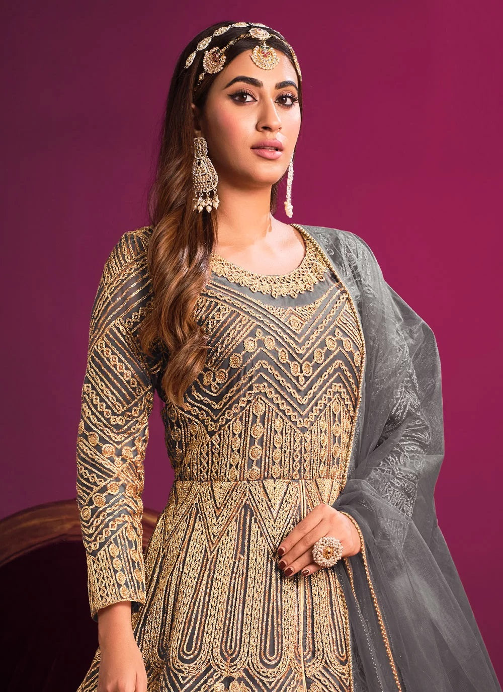 Grey net heavy embroidered anarkali