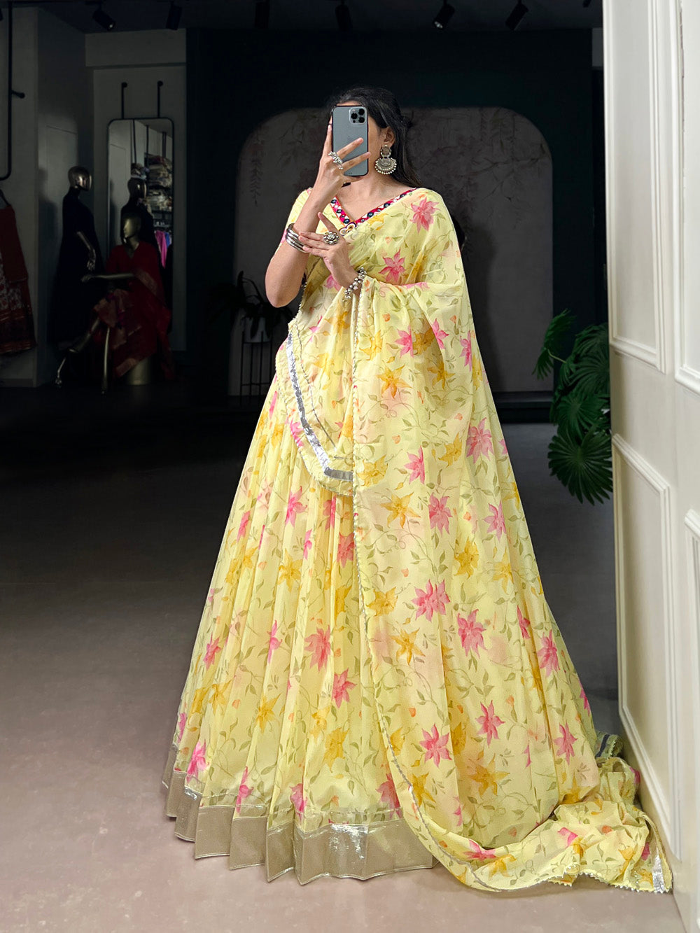 Yellow tubby silk floral printed lehenga choli with mirror work embossed lace detailing