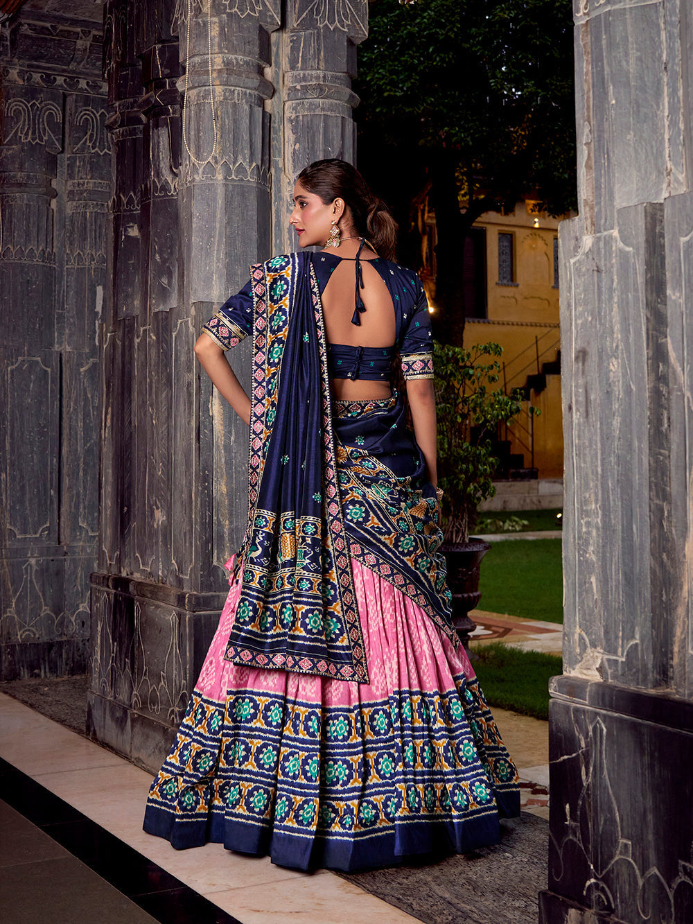 Light pink tasar silk ikat patola print lehenga choli with blue embroidered blouse dupatta