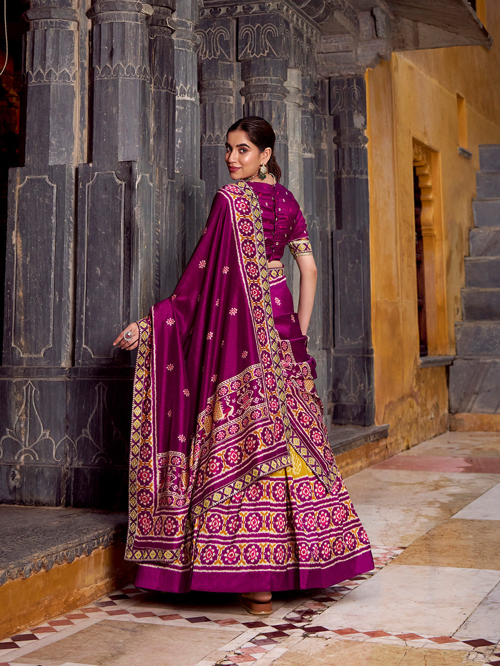 Mustard tasar silk ikat patola print lehenga choli set with wine embroidered blouse dupatta