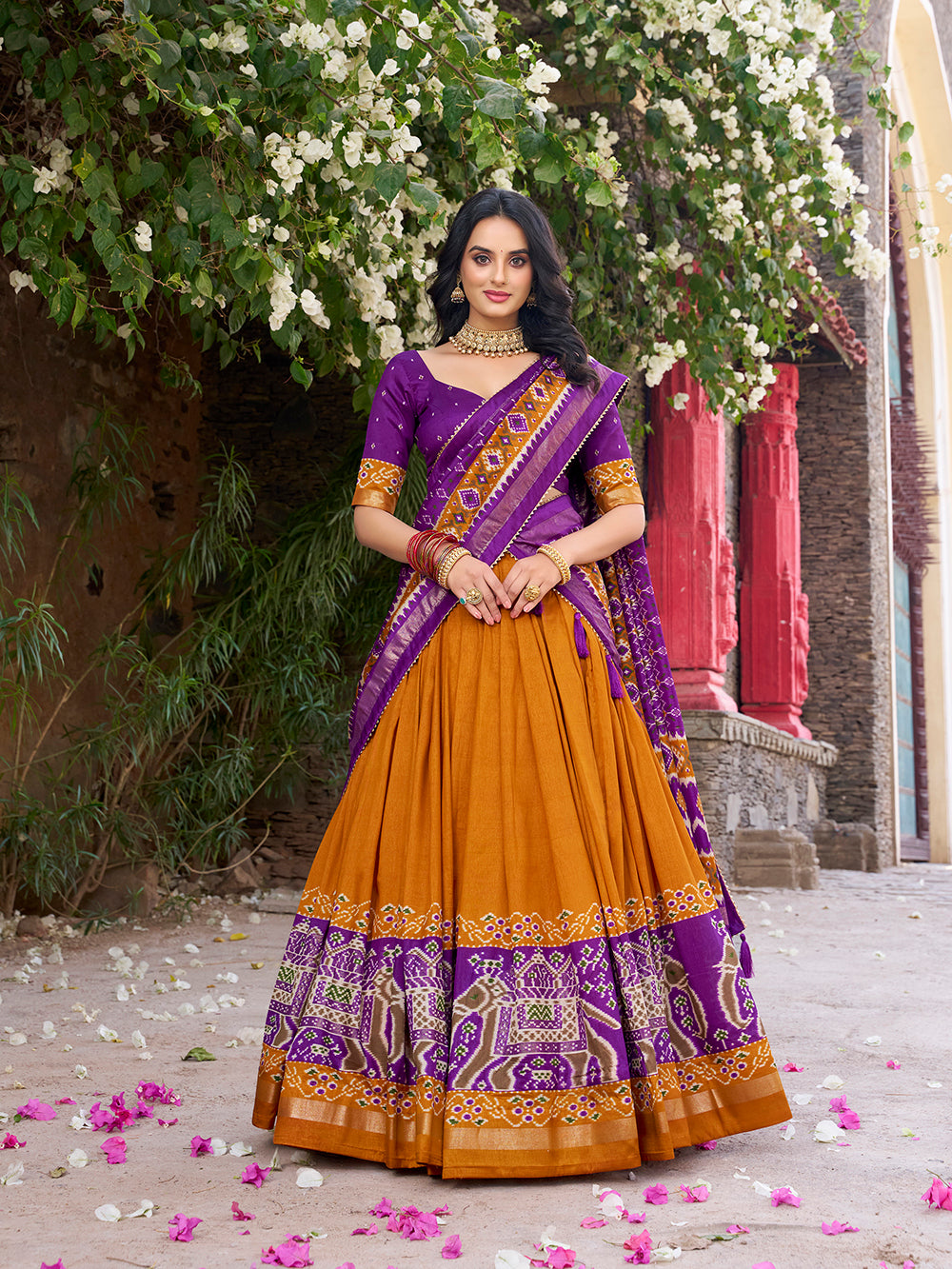 Mustard tasar silk lehenga choli with patola print foil work elegance