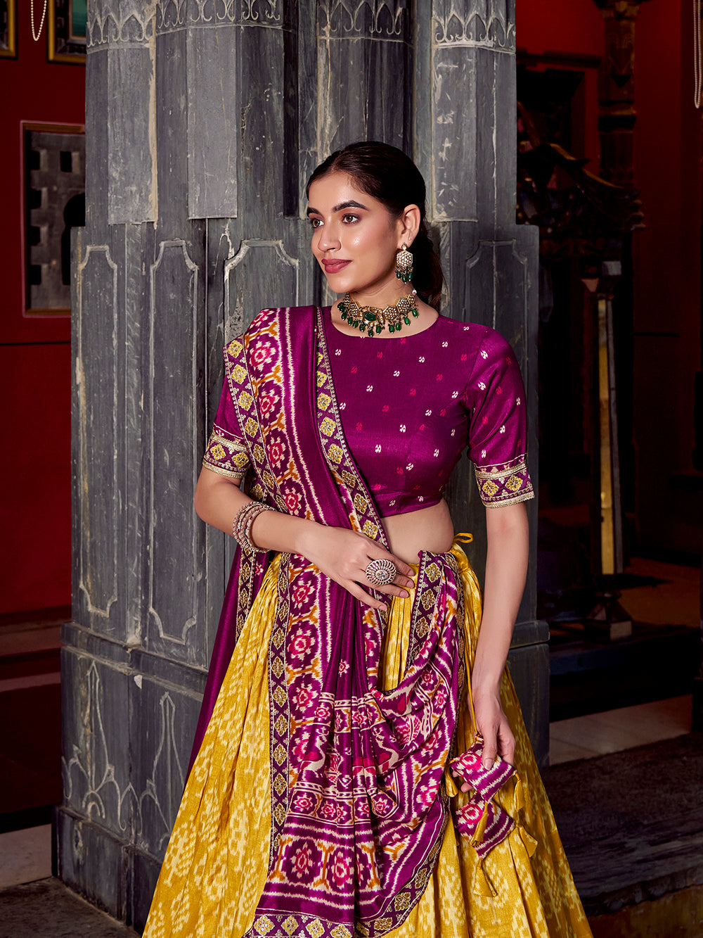 Mustard tasar silk ikat patola print lehenga choli set with wine embroidered blouse dupatta