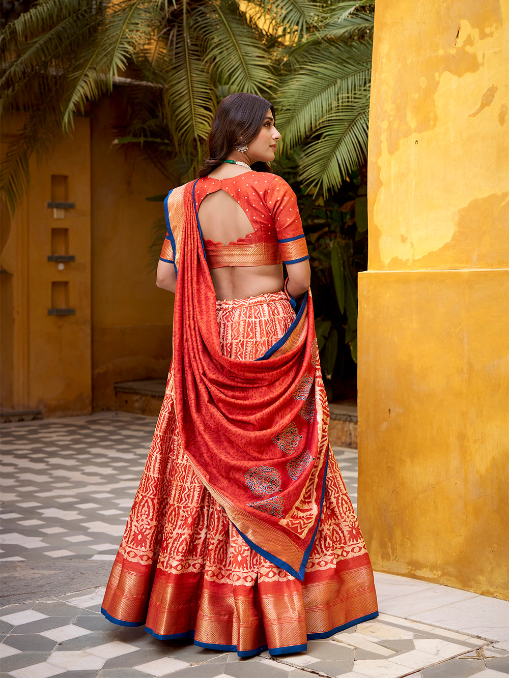 Rust orange color batik printed dola silk lehenga