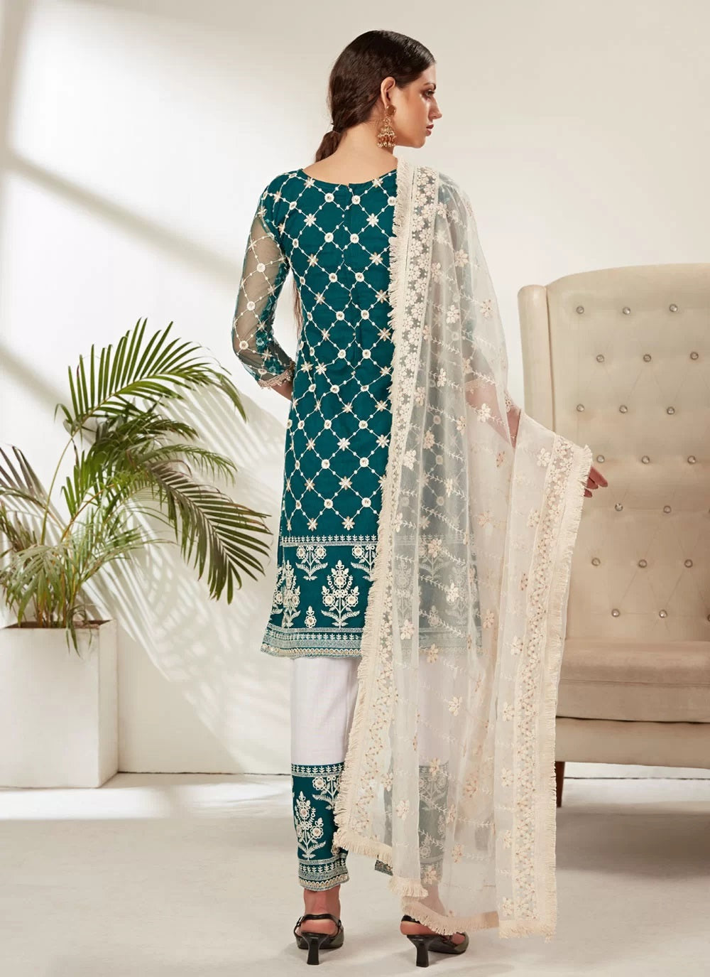 Heavy butterfly net pakistani embroidered suit in rama