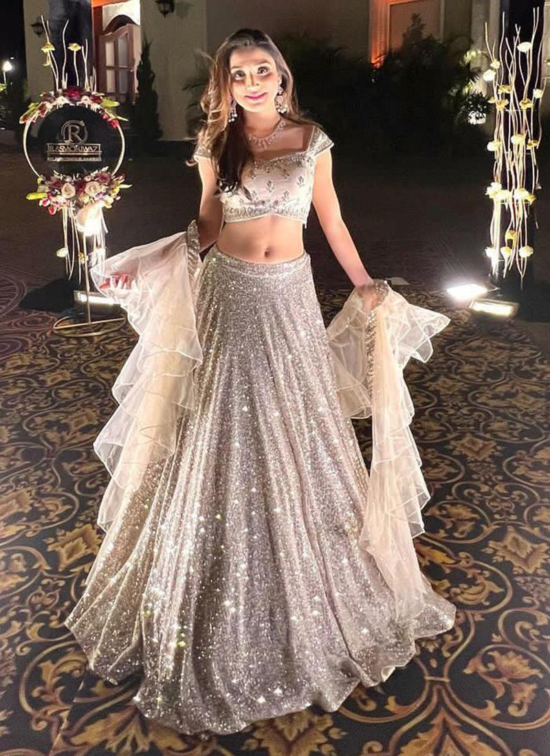 Heavy Sequins Sleeveless Cream Flared Lehenga Choli