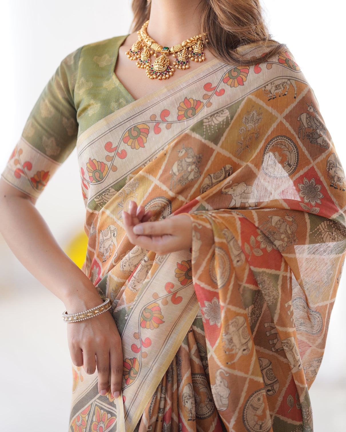 Multicolor zari woven handloom cotton saree with traditional animal floral motifs and tassels