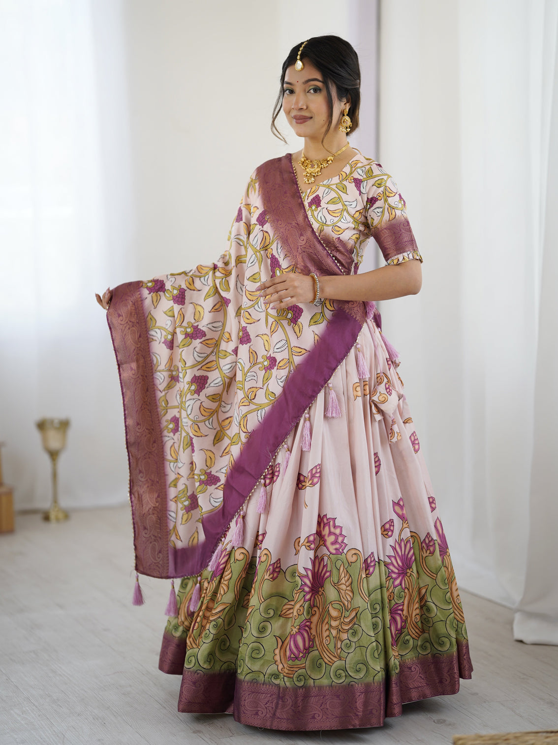 Pastel pink kalamkari silk lehenga with tassel dupatta zari border festive wedding wear