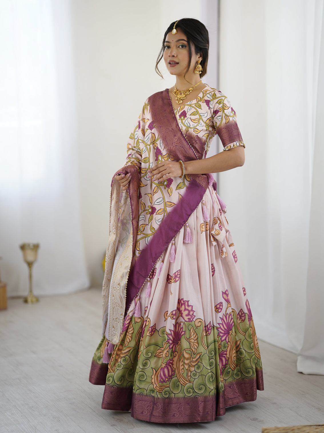 Pastel pink kalamkari silk lehenga with tassel dupatta zari border festive wedding wear