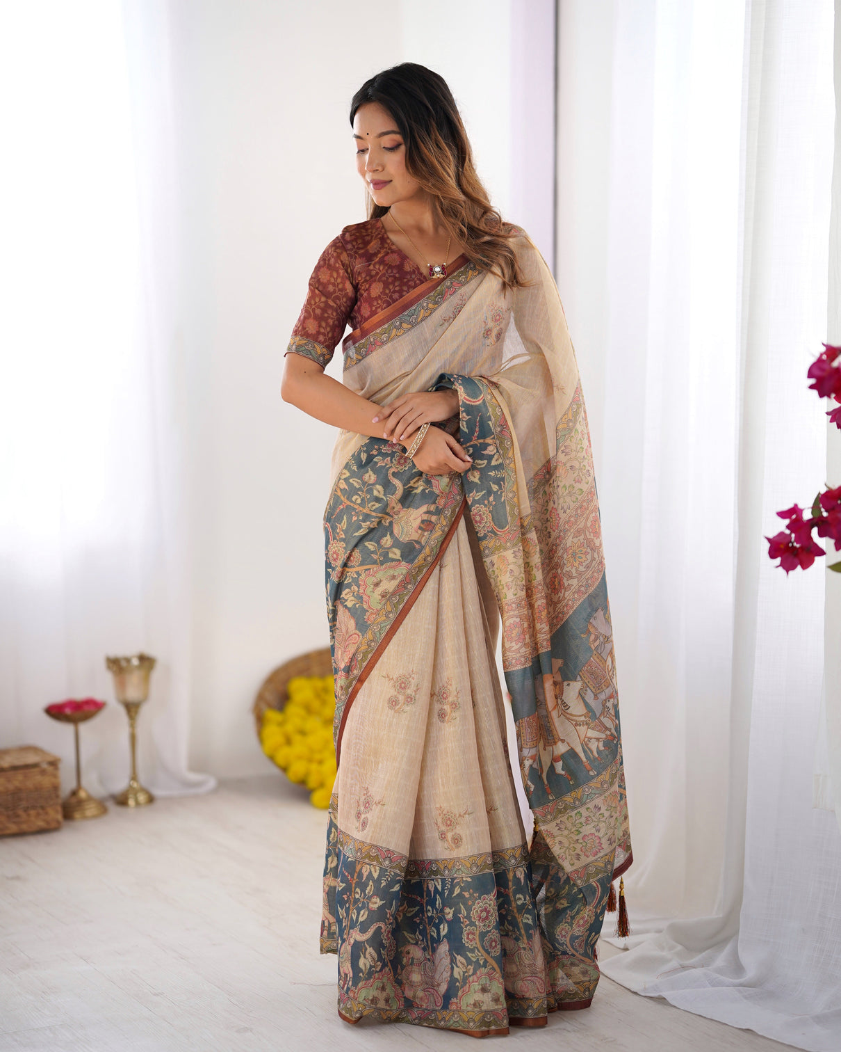Beige handloom cotton saree with maroon blouse and multicolor royal procession pallu