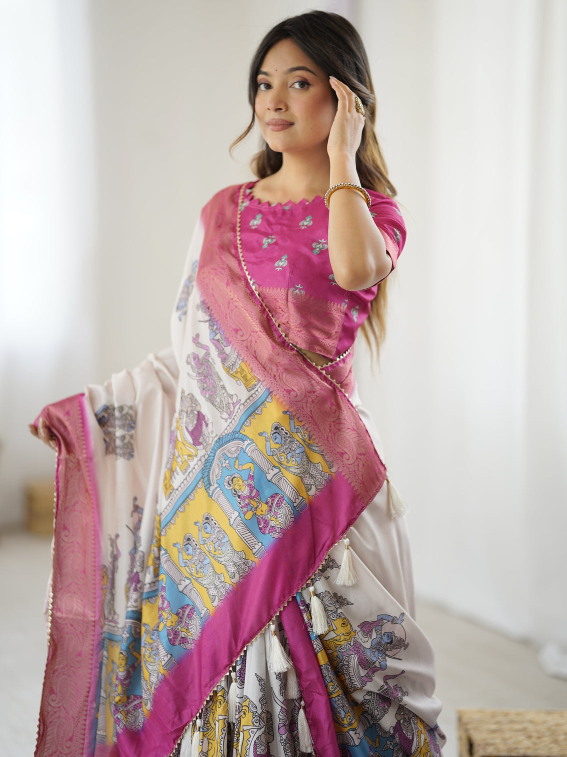 Elegant kalamkari lehenga in magenta and multicolor with flared skirt and dupatta