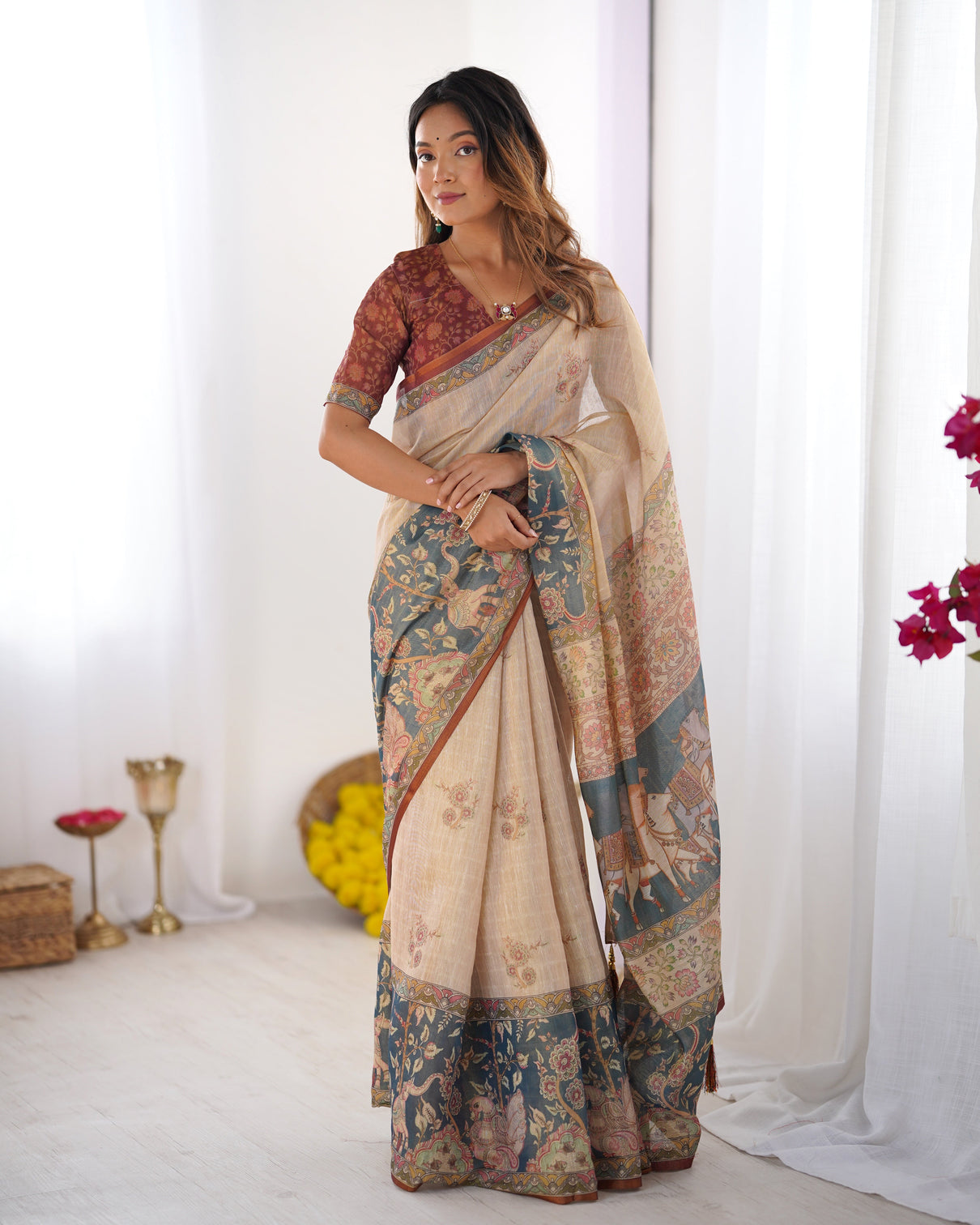 Beige handloom cotton saree with maroon blouse and multicolor royal procession pallu
