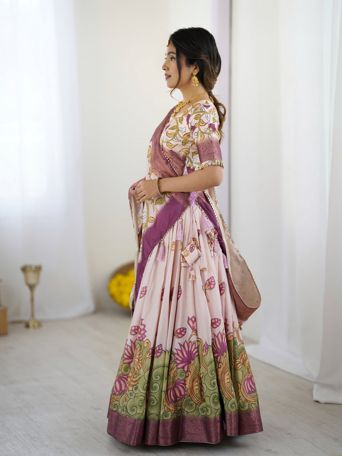 Pastel pink kalamkari silk lehenga with tassel dupatta zari border festive wedding wear