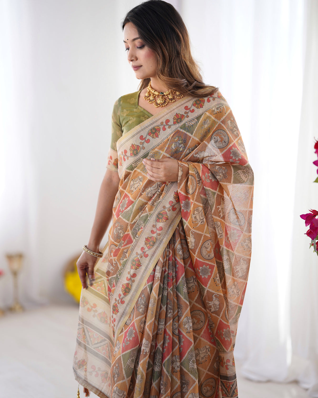 Multicolor zari woven handloom cotton saree with traditional animal floral motifs and tassels