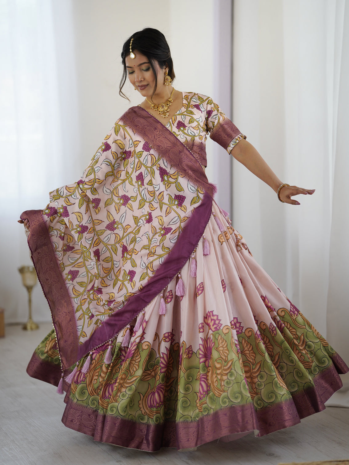 Pastel pink kalamkari silk lehenga with tassel dupatta zari border festive wedding wear mameraa