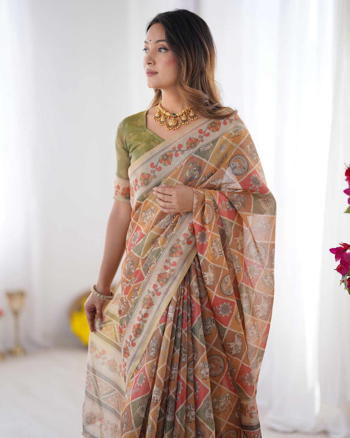 Multicolor zari woven handloom cotton saree with traditional animal floral motifs and tassels