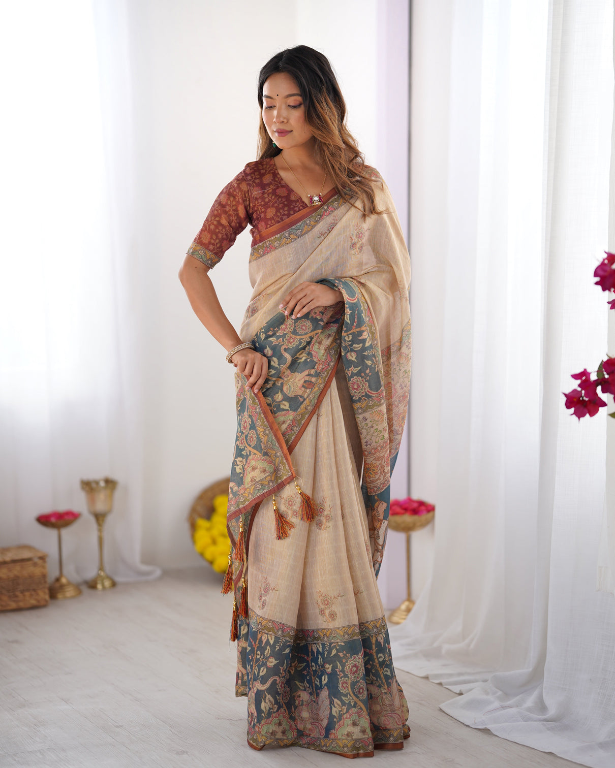Beige handloom cotton saree with maroon blouse and multicolor royal procession pallu