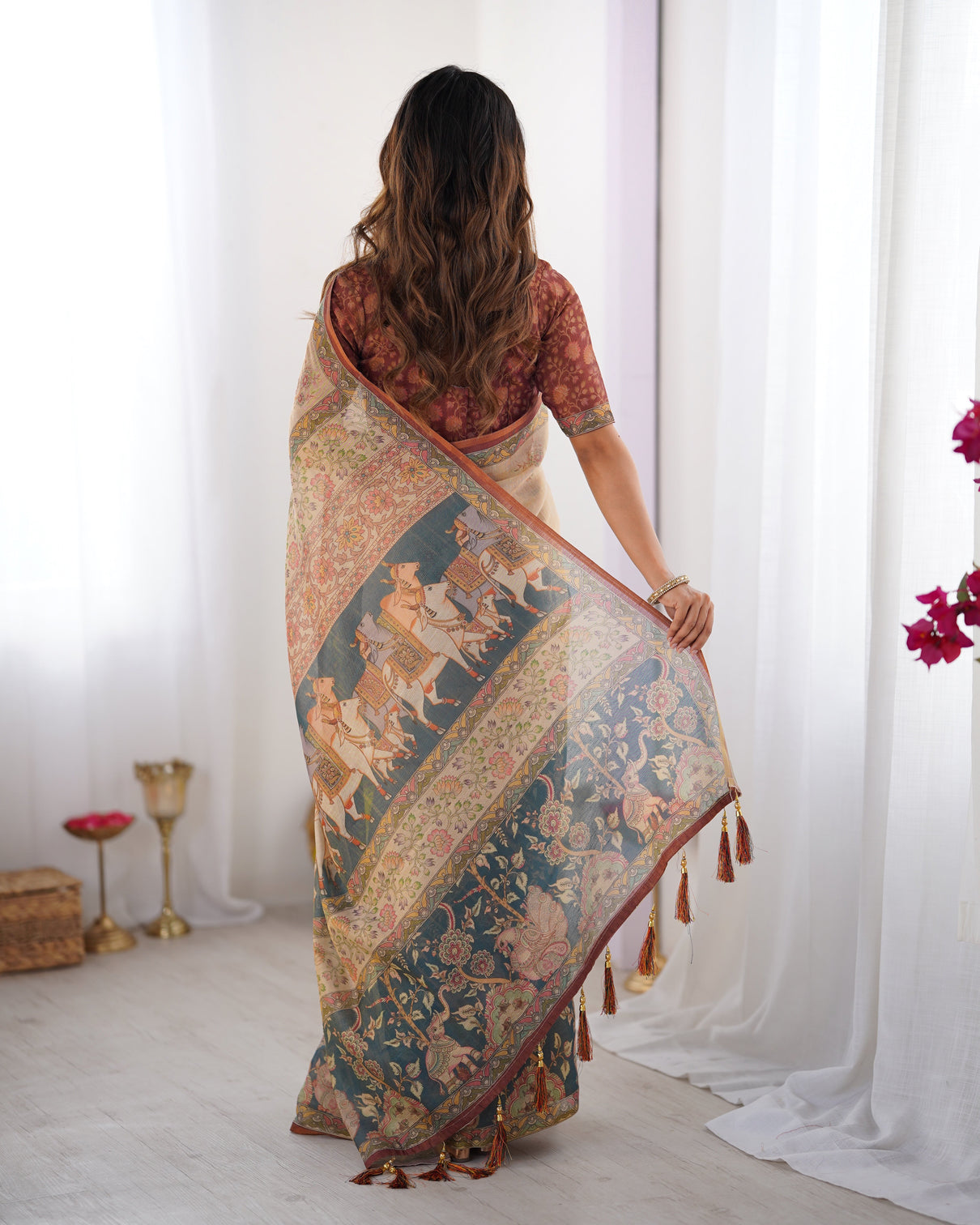 Beige handloom cotton saree with maroon blouse and multicolor royal procession pallu