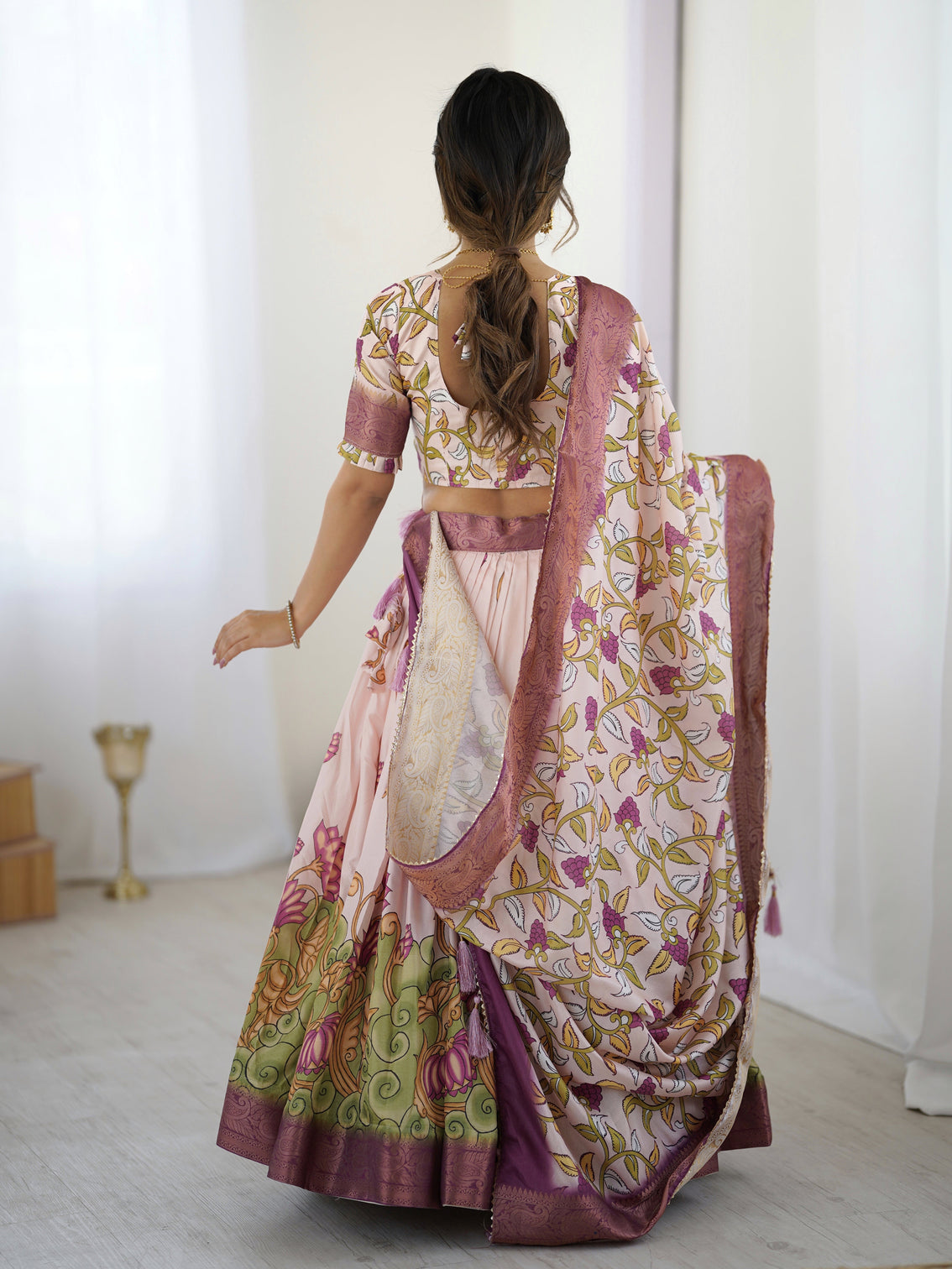 Pastel pink kalamkari silk lehenga with tassel dupatta zari border festive wedding wear