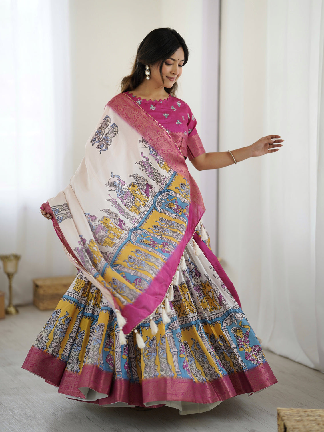 Elegant kalamkari lehenga in magenta and multicolor with flared skirt and dupatta