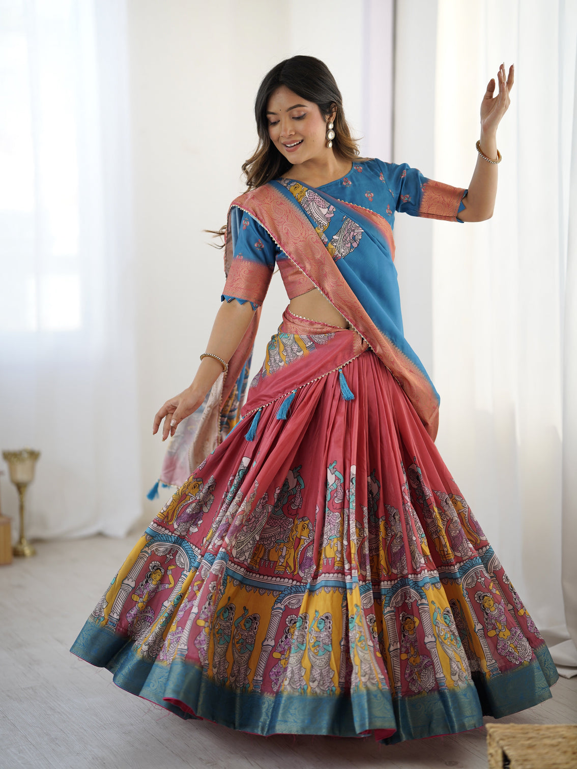 Elegant kalamkari lehenga in blue and terracotta pink with flared skirt and dupatta mameraa