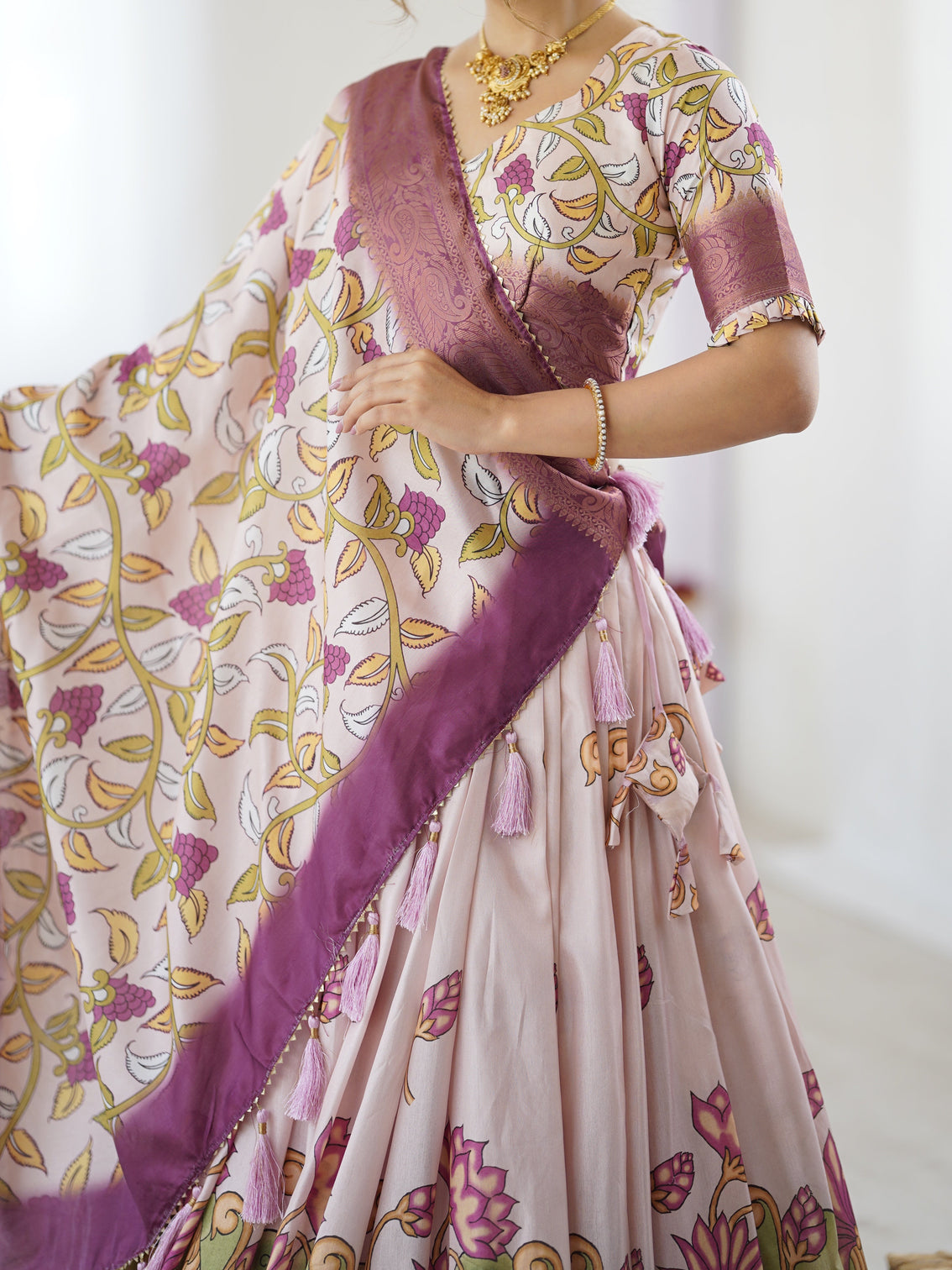 Pastel pink kalamkari silk lehenga with tassel dupatta zari border festive wedding wear