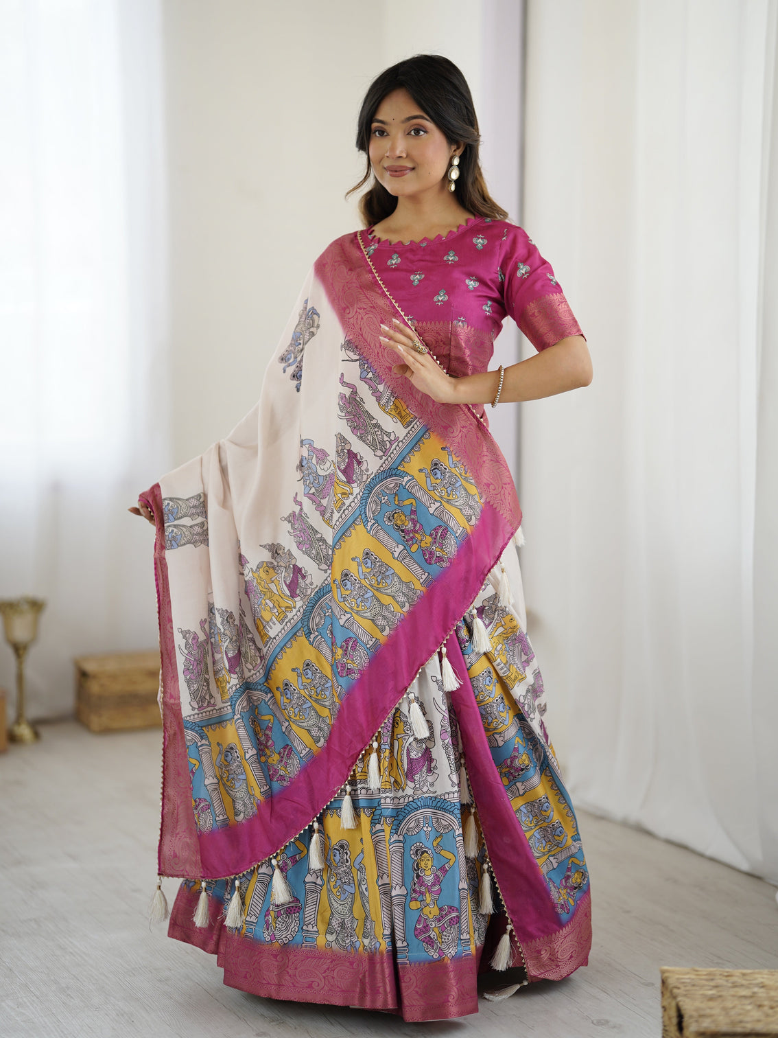 Elegant kalamkari lehenga in magenta and multicolor with flared skirt and dupatta