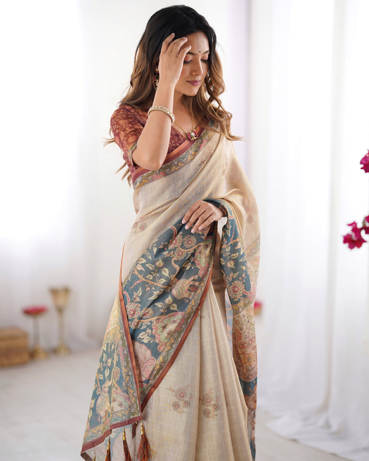 Beige handloom cotton saree with maroon blouse and multicolor royal procession pallu