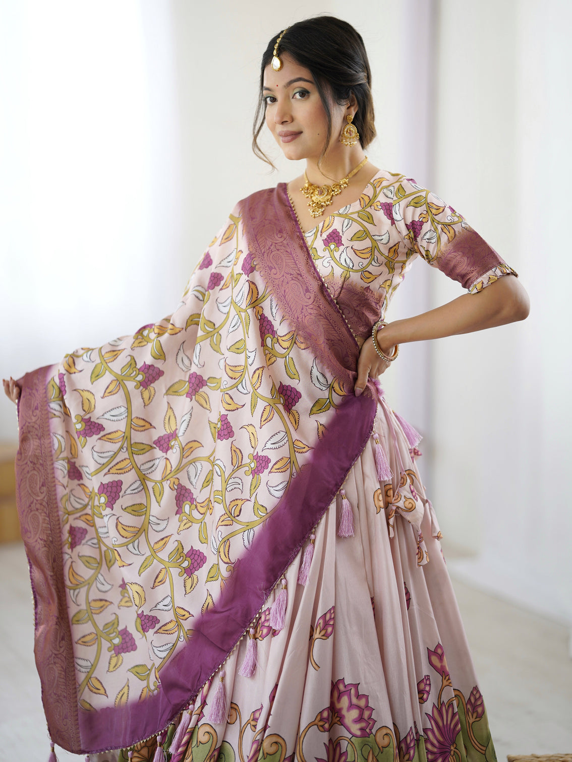 Pastel pink kalamkari silk lehenga with tassel dupatta zari border festive wedding wear