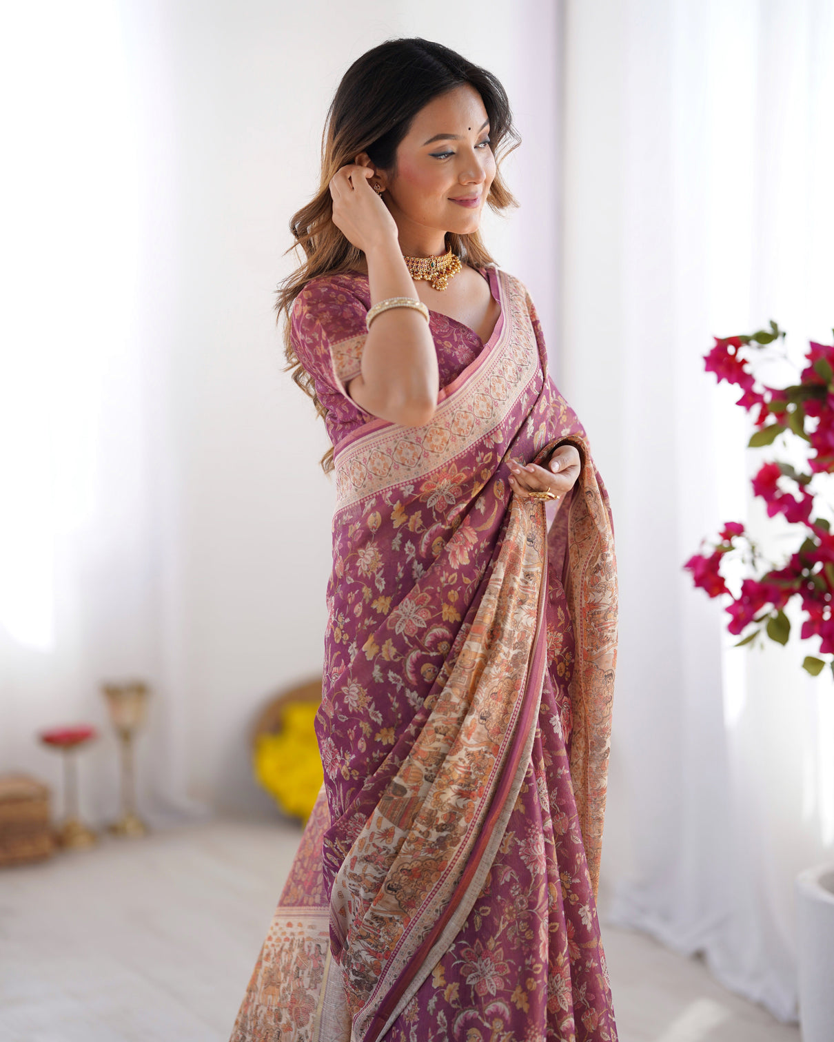 Plum handloom cotton saree with floral print mythical border tassels