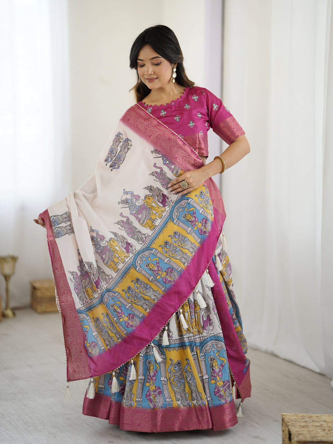 Elegant kalamkari lehenga in magenta and multicolor with flared skirt and dupatta
