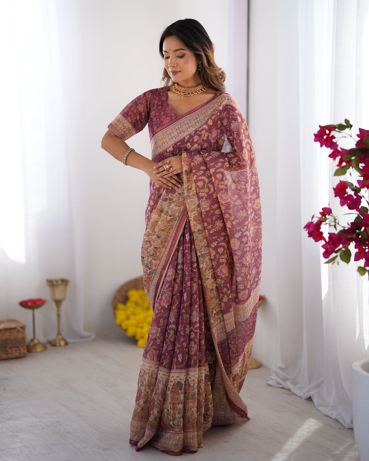 Plum handloom cotton saree with floral print mythical border tassels