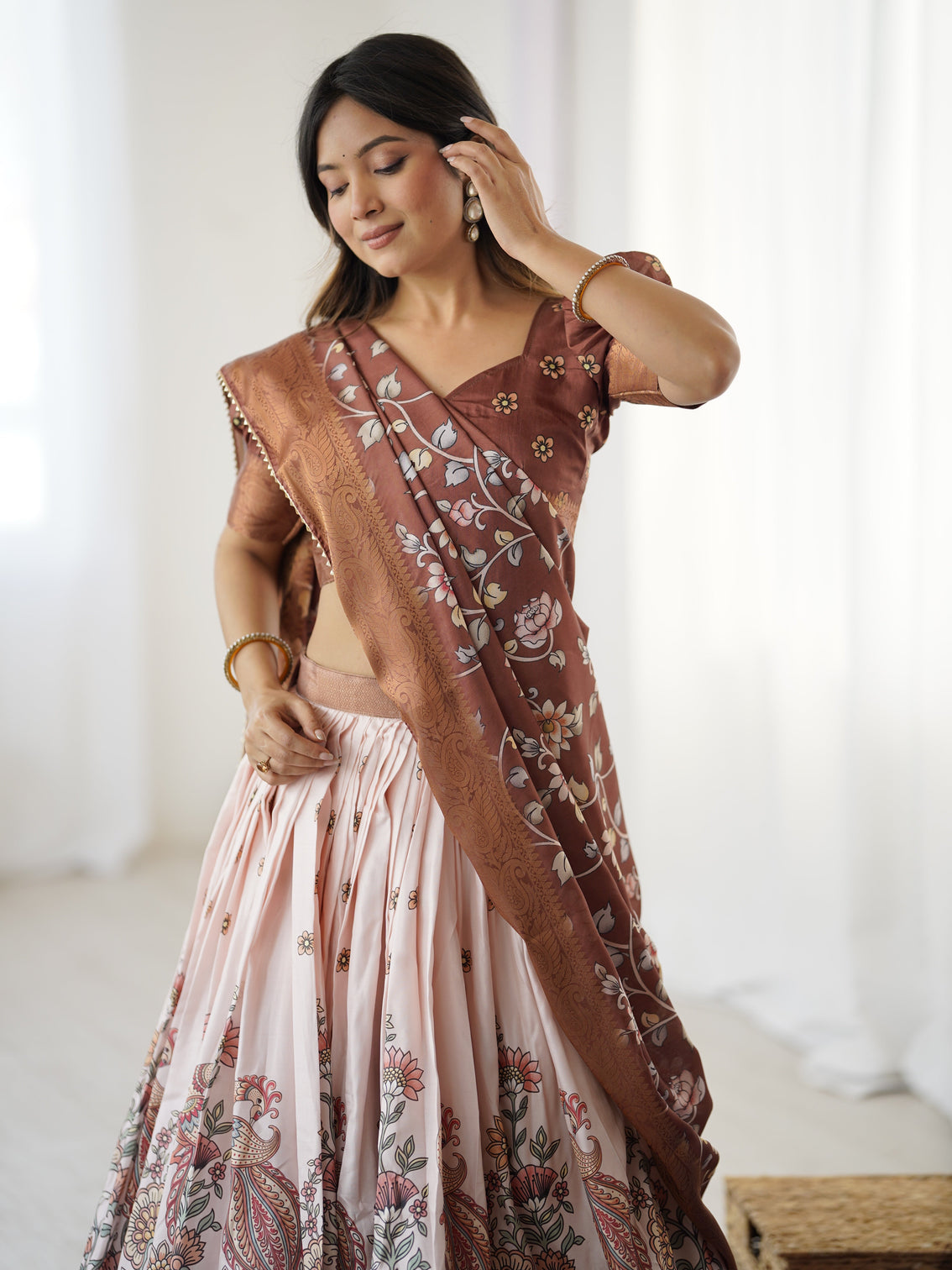 Peach copper brown kalamkari lehenga with elegant floral dupatta