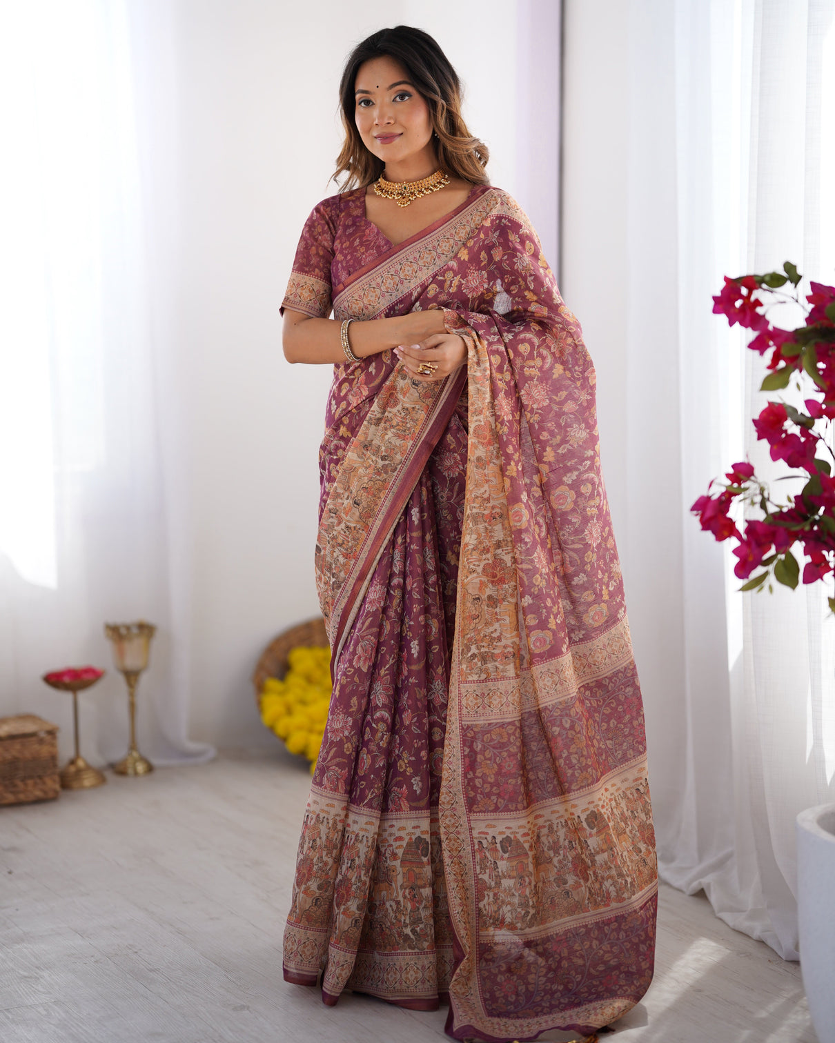 Plum handloom cotton saree with floral print mythical border tassels mameraa