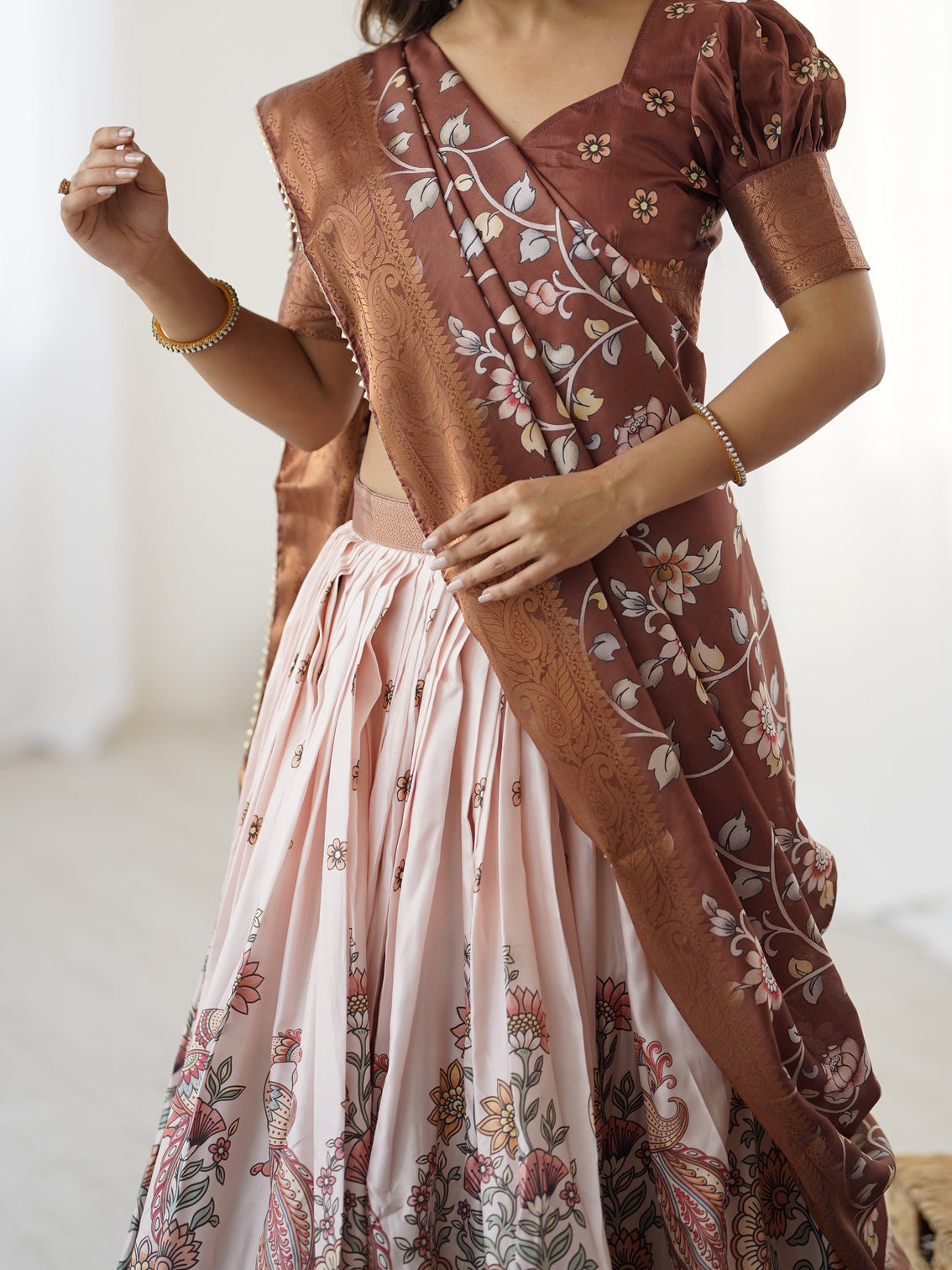 Peach copper brown kalamkari lehenga with elegant floral dupatta