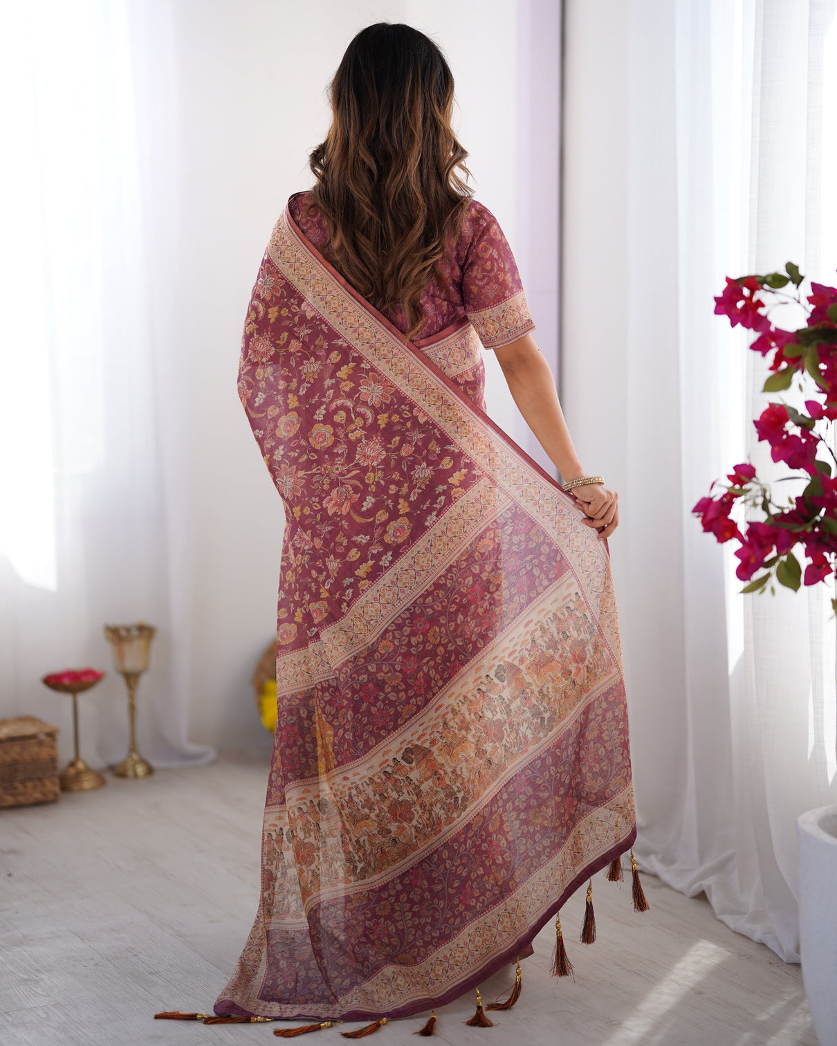 Plum handloom cotton saree with floral print mythical border tassels