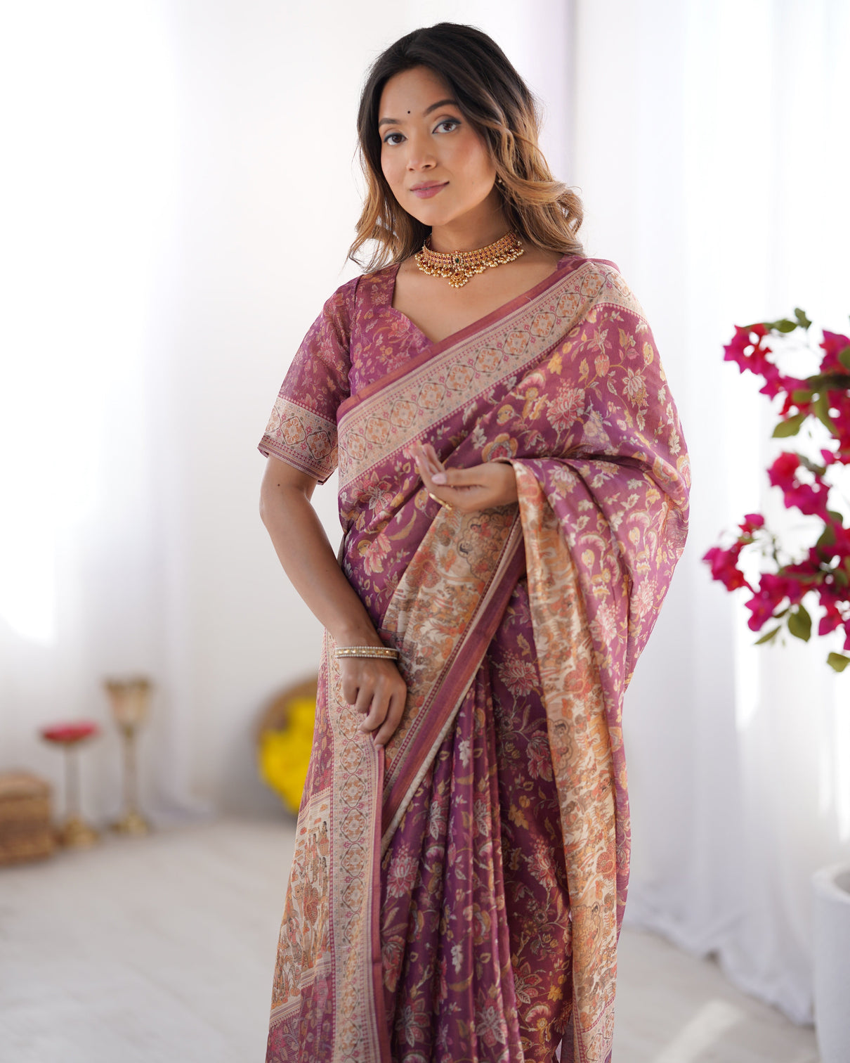 Plum handloom cotton saree with floral print mythical border tassels