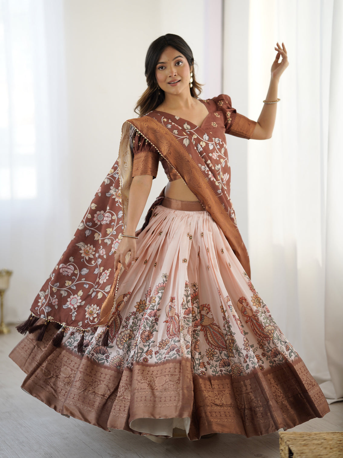 Peach copper brown kalamkari lehenga with elegant floral dupatta mameraa