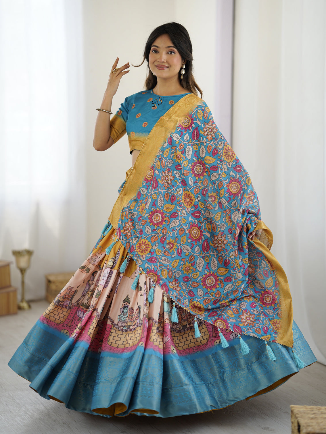 Elegant kalamkari lehenga in blue and peach with floral dupatta and flared skirt mameraa