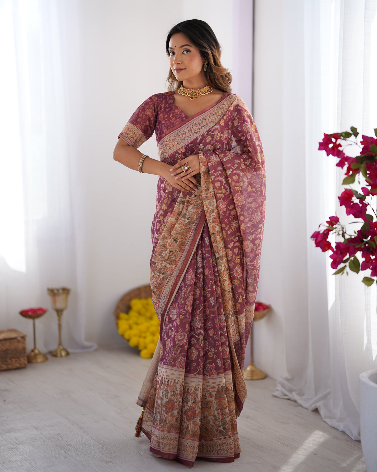 Plum handloom cotton saree with floral print mythical border tassels