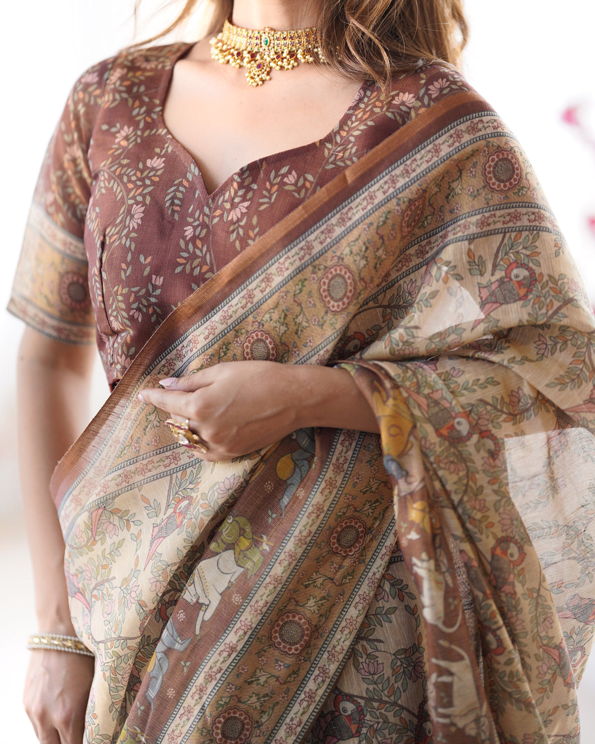 Beige brown handloom cotton saree with mythical kalamkari pallu and elephant motifs