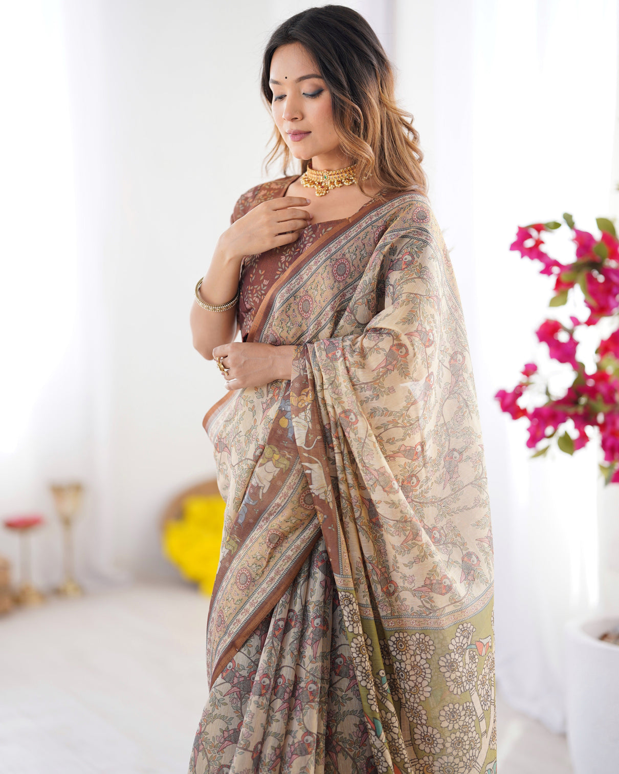 Beige brown handloom cotton saree with mythical kalamkari pallu and elephant motifs