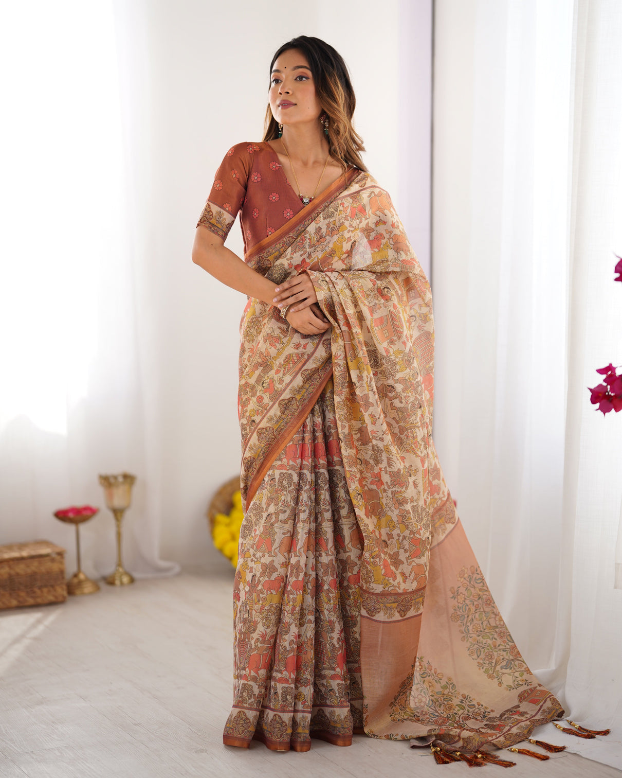 Beige handloom cotton saree with rust blouse and village celebration print mameraa
