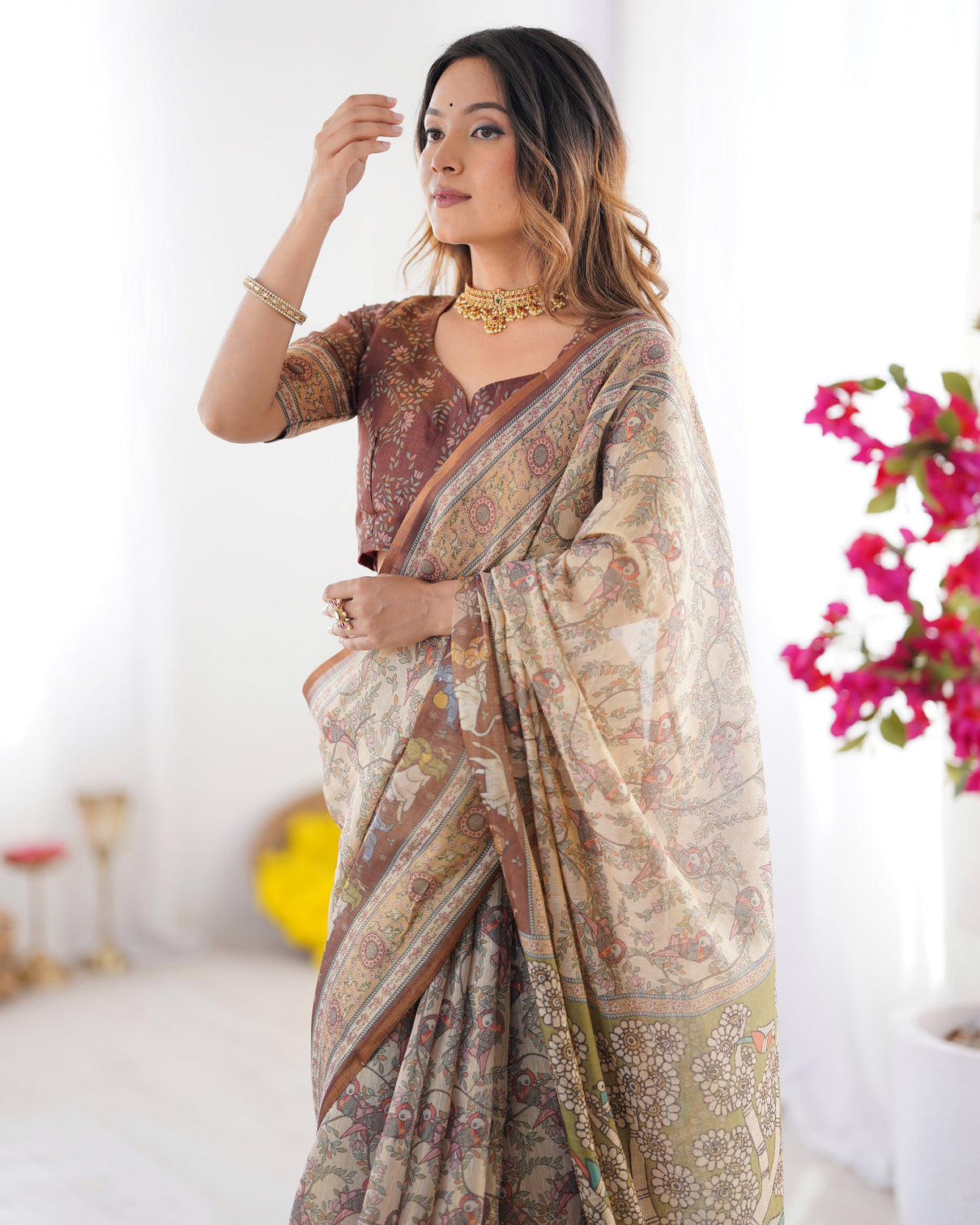 Beige brown handloom cotton saree with mythical kalamkari pallu and elephant motifs