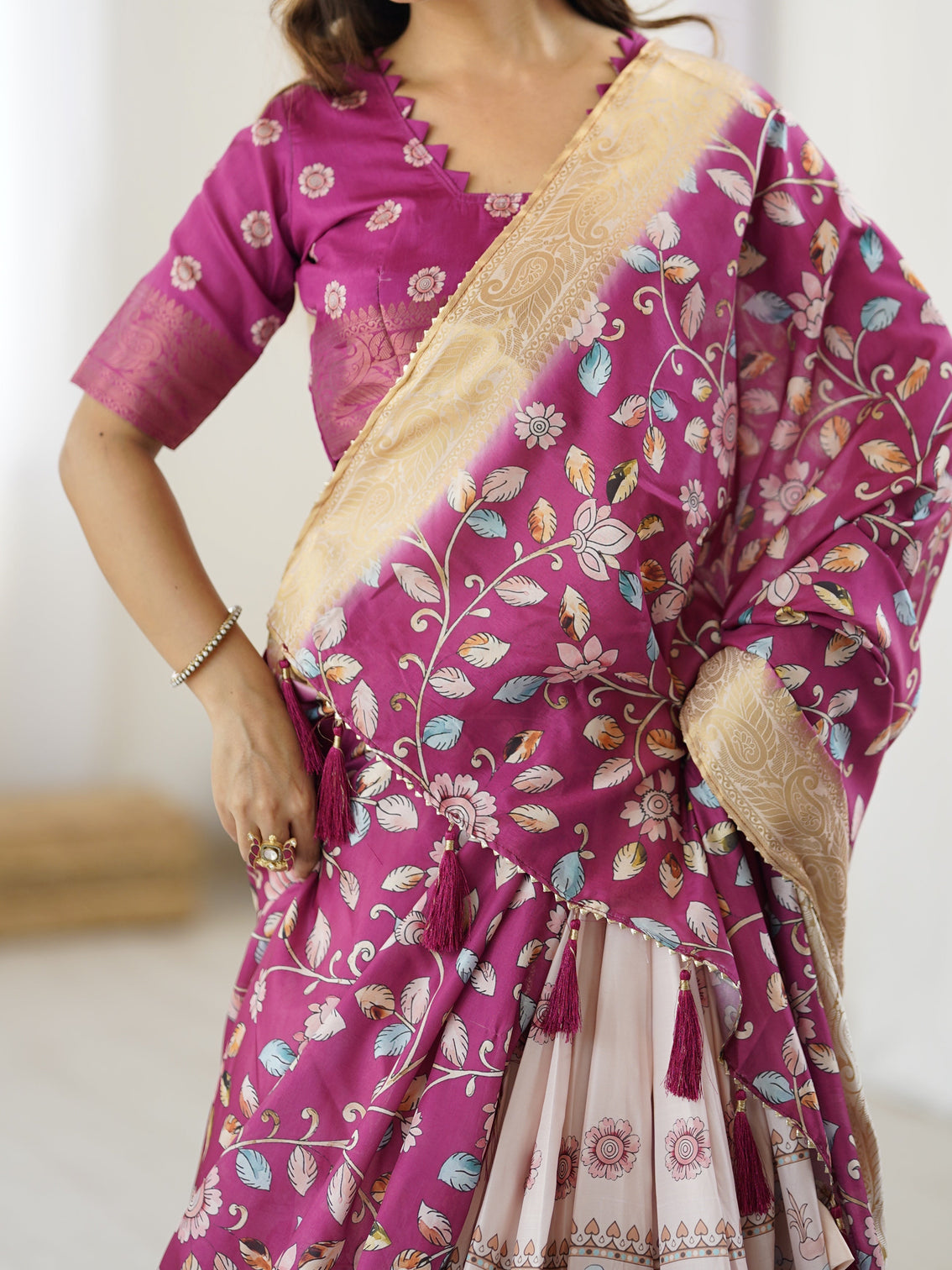 Elegant kalamkari lehenga in wine and peach with divine print and floral zari dupatta