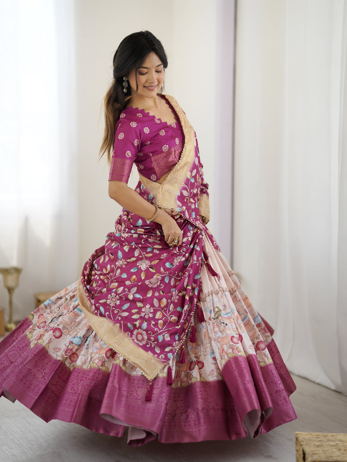 Elegant kalamkari lehenga in wine and peach with divine print and floral zari dupatta