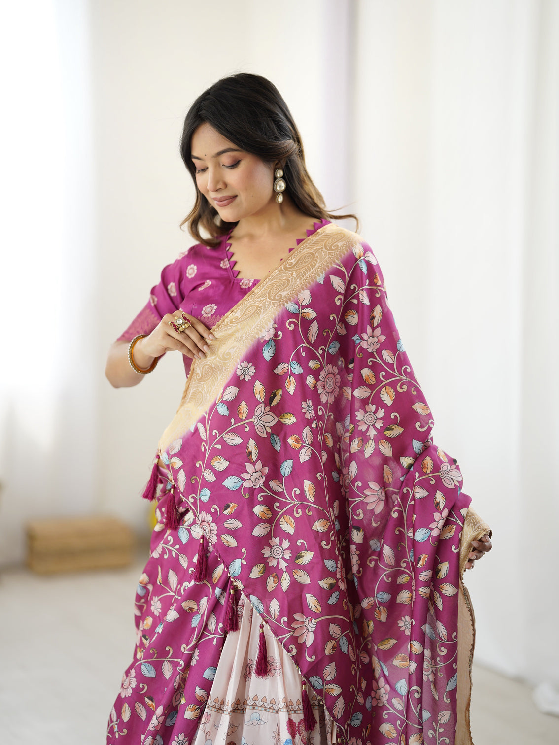 Elegant kalamkari lehenga in wine and peach with divine print and floral zari dupatta