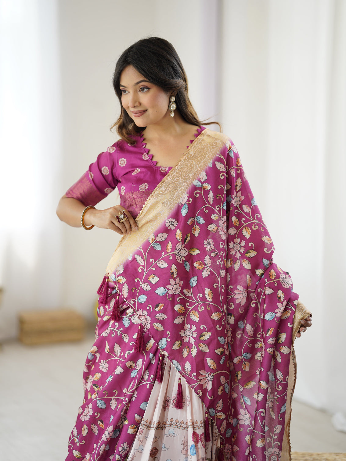 Elegant kalamkari lehenga in wine and peach with divine print and floral zari dupatta
