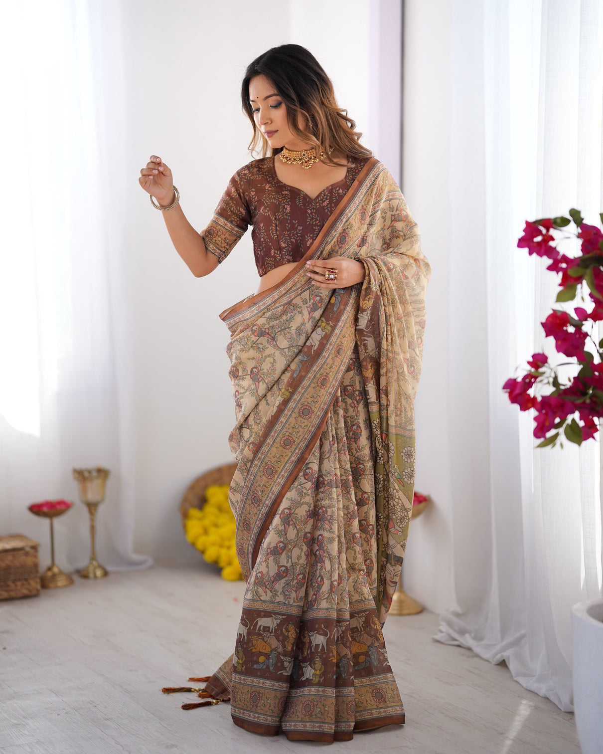 Beige brown handloom cotton saree with mythical kalamkari pallu and elephant motifs