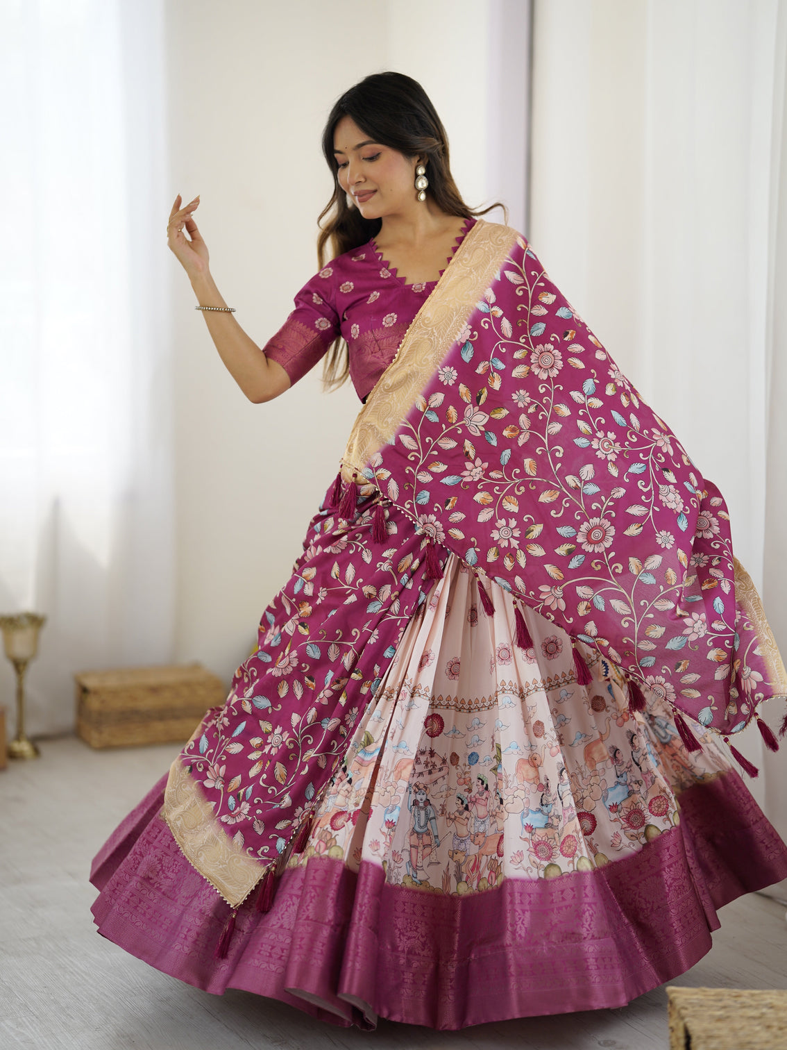 Elegant kalamkari lehenga in wine and peach with divine print and floral zari dupatta