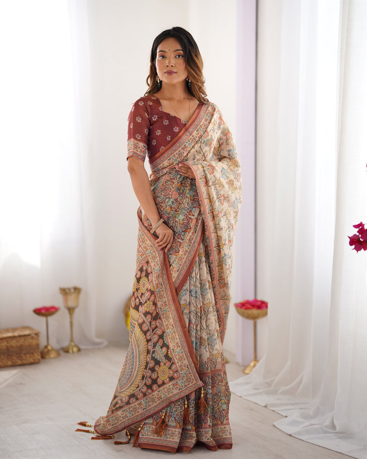 Beige maroon handloom cotton saree with multicolor floral print and majestic bird art pallu
